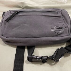 Gray Belt Bag with Curved Design and Multiple Compartments
